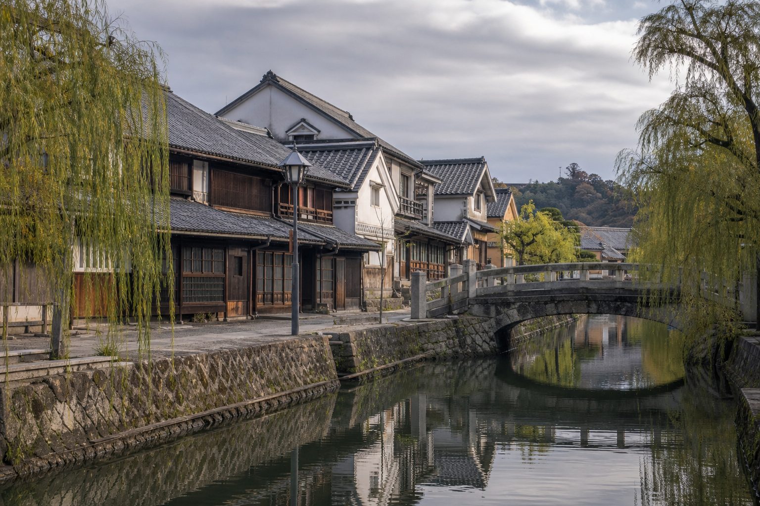 A quiet canal city, suggesting a destination reached after planning